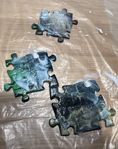 Glueing the screw puzzles on the front.
